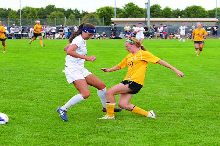 Sophomore Tara Dennehy battles for a loose ball in the second half.