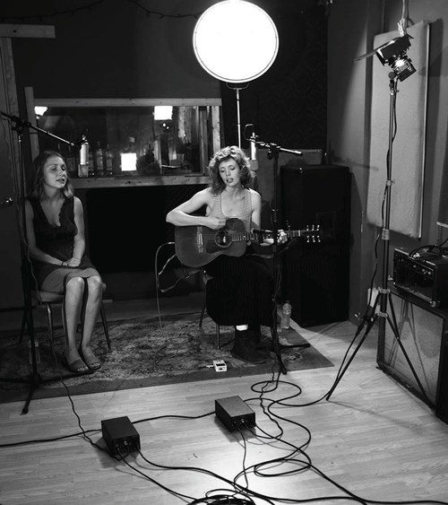 Haley Bonar sings with sophomore Hannah Hebl for the Arco Sessions. Submitted