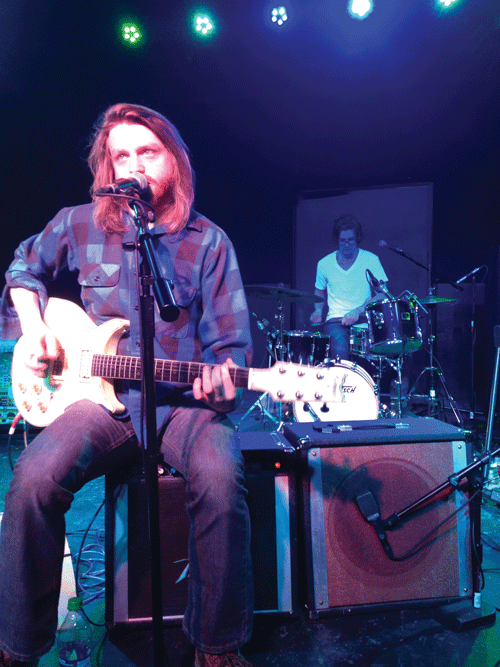 Guitarist Josh Ingersoll performs from his group’s new album, “Gunfighter” on Saturday night at the House of Rock. © 2014 Emily Albrent