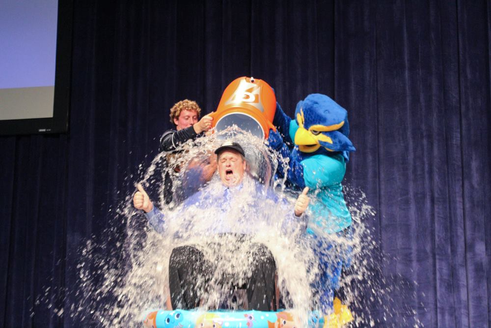 Chancellor+James+C.+Schmidt+gets+wet+as+he+takes+the+ALS+Ice+Bucket+Challenge+during+Phase+II+orientation+Friday.