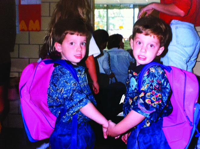 Tyler Henderson and Lucas Henderson rock their matching pink backpacks on the first day of 3-year-old preschool.