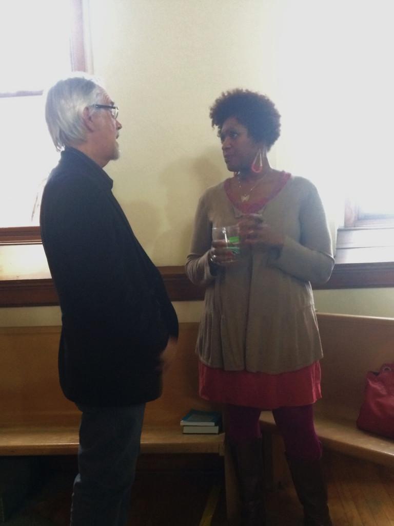 Wisconsin State Poet Laureate and English professor at UW-Eau Claire Max Garland (left) was in attendance at Dasha Kellys (right) reading last Friday.
