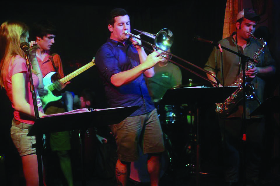 Tyler Henderson, Multimedia Editor of The Spectator, plays trombone with local funk band Love Taxi at The Mousetrap Tavern. 