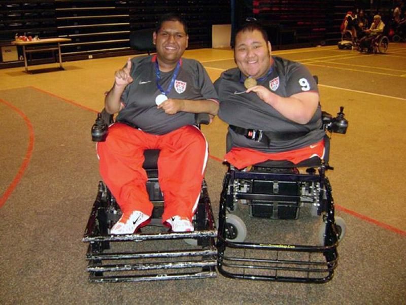 Teammate Omar Solorio poses for a photo with Winslow after winning the 2011 world cup in Paris, France.