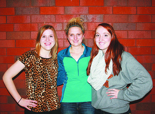 Left to right, Cronin, Wegener and Cafferty have worked to form a new running club on campus. Their work out times vary throughout the week, but mimic the same kind of structure. - Photo by Meghan Hosely
