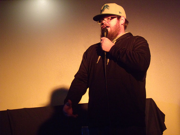 JOKE’S ON YOU: Justin Schenck closes an evening of comedy at Pizza Plus on Tuesday. He is one of several comedians who regularly performs at Tuesday open-mic nights. - Photo by Sam Martinez