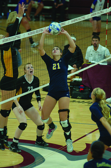 Setter Jenna Smits wears her knee brace for precautionary measures. Smits had two ACL reconstructive surgeries in high school. - Submitted