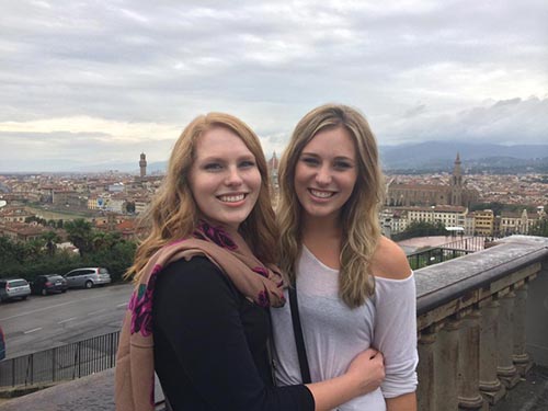 Junior Emily Johnson, right, said she will miss the gorgeous views of Florence Italy, where she poses with one of the friends she made while traveling. - Submitted 