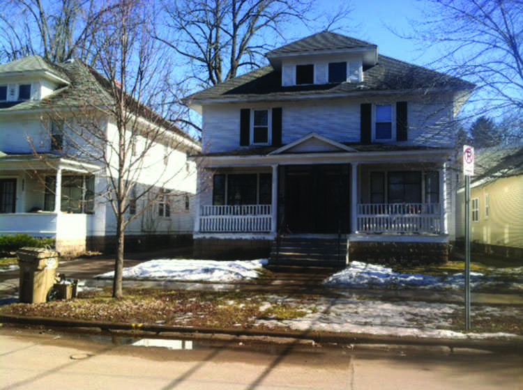 Glen Olson’s house, along with his neighbor’s equally victimized garbage cans. 