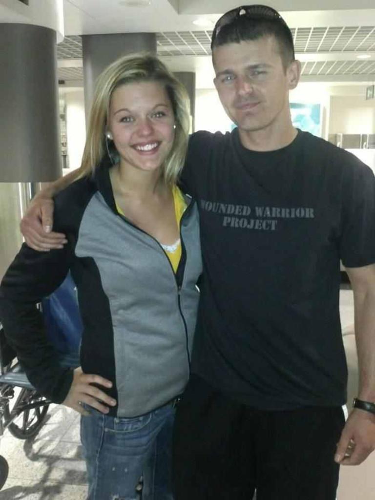 Brianna Shoulak and her late brother, Chad Shoulak, reunite in 2013 at the Austin Straubel airport in Green Bay, Wisconsin. Chad had just returned from South Korea.