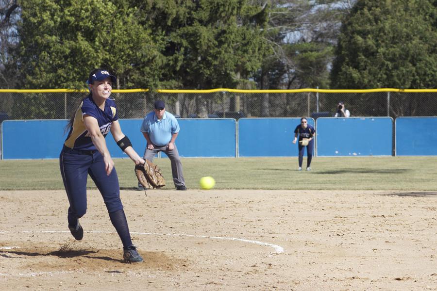 Senior pitcher Laura Raflik shoots off the mound at a Marian batter to land the third out in the top of the fifth inning.