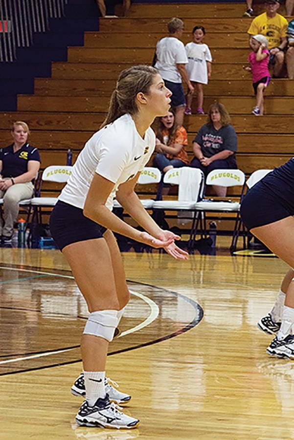 Freshmen Amber Karn awaits the serve in Zorn Arena. The match was moved from Mcphee after court condensation.