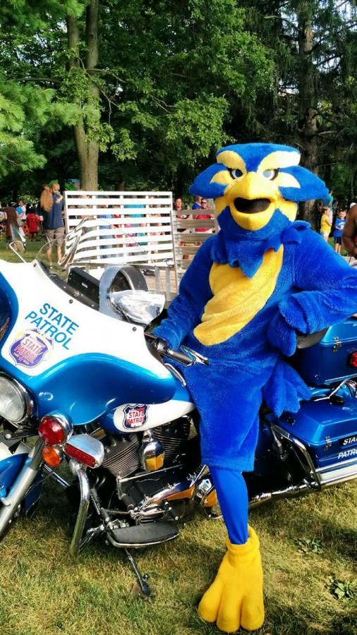 The Blugold mascot poses on a motorcycle at the community event, National Night against crime, held in Owen Park.