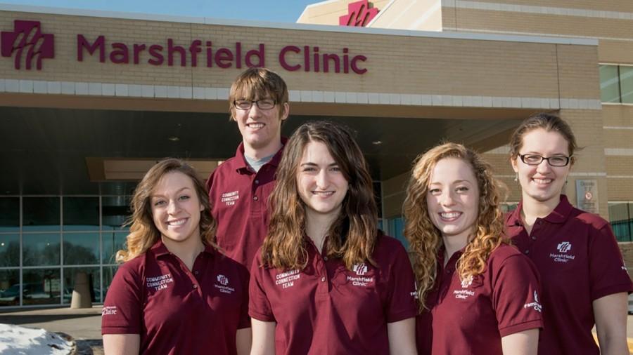 Hamer and the other Community Connection team members pose outside of Marshfield Clinic. 
