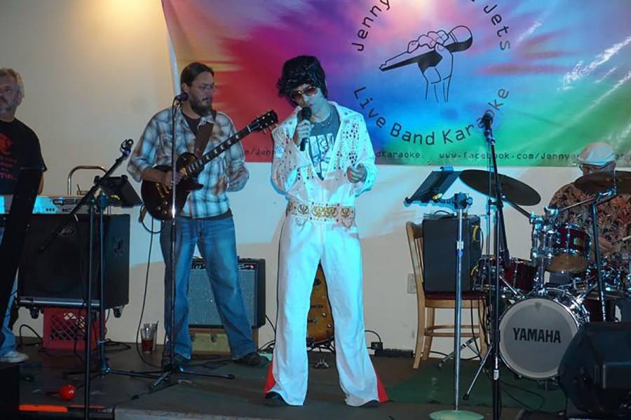 Senator Colton Ashley dressed as Elvis Presley and singing his music with live karaoke band Jenny and the Jets at The Plus on a Monday night after a Student Senate meeting.