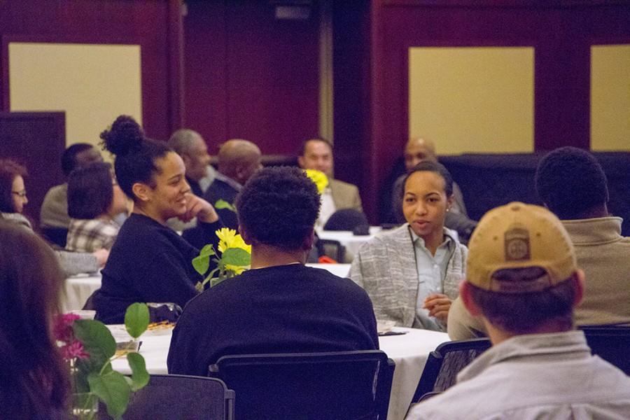 The+Black+Student+Alliance+presented+the+Black+History+Month+dinner+reception+Feb.+5%2C+which+honored+African+American+veterans.+BSA+executive+members+Laura+McDew%2C+left%2C+and+Kiana+Veal+engage+in+conversation+at+the+reception.