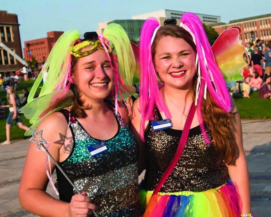 Cleven-Peterson poses with Katelyn Klieve in fairy outfits for the Freshman Convocation this year.