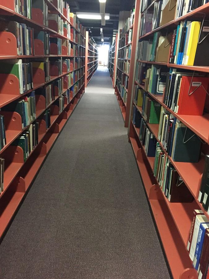 The fourth floor of the McIntyre library houses rows upon rows of books for student use
