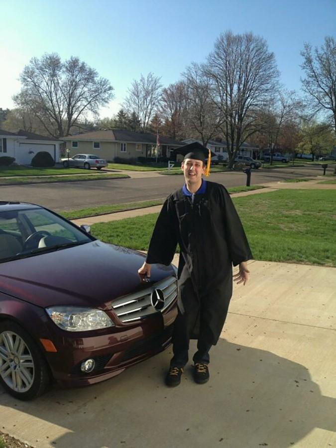 Bryan+poses+in+front+of+his+brother%E2%80%99s+mustang+in+May+2013+after+graduating+from+CVTC.+He+is+pursuing+a+degree+in+journalism+this+fall.
