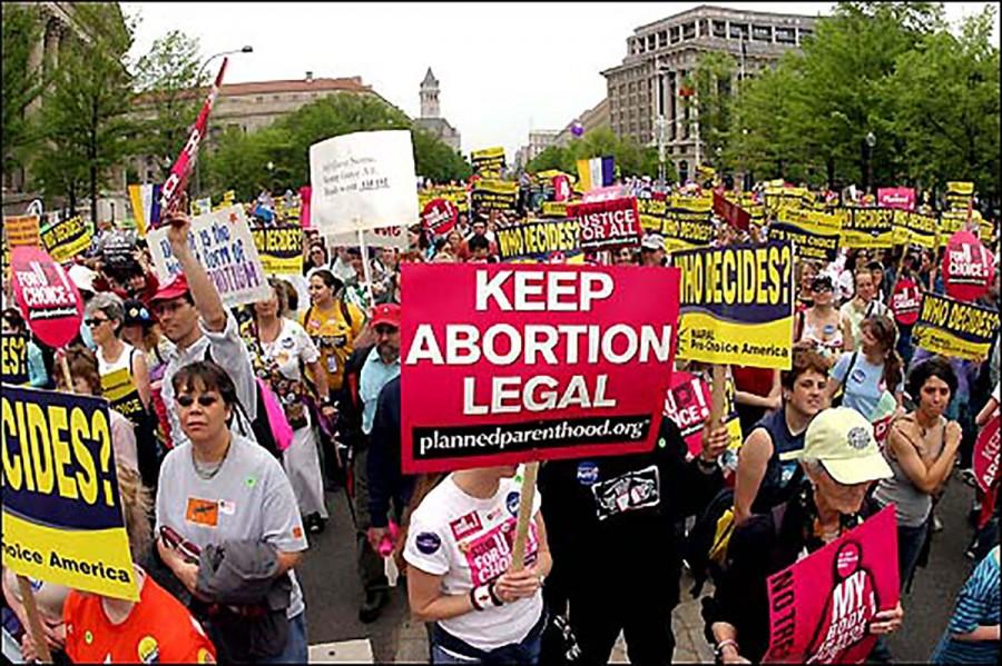 A+group+of+pro-choice+protesters+gather+in+Madison+to+advocate+for+reproductive+rights.+