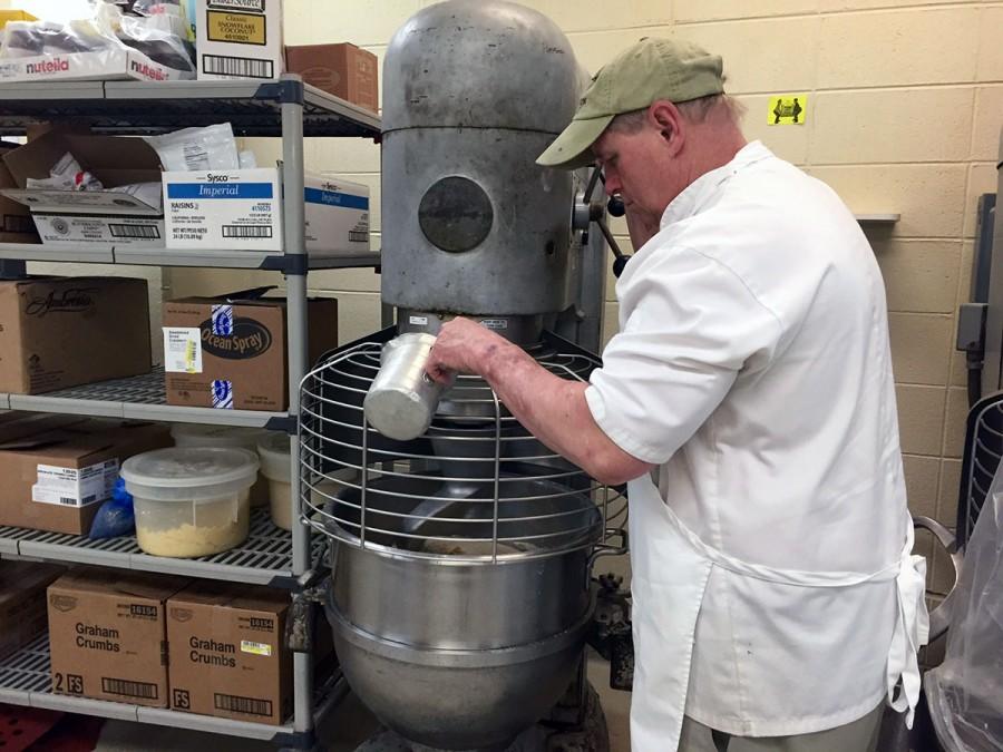 Jim Solfest, manager of Hilltop Bakery, makes a batch of dinner rolls for Hilltop Center. As manager for the past 23 years, Solfest is in charge of making all of the baked goods on campus.