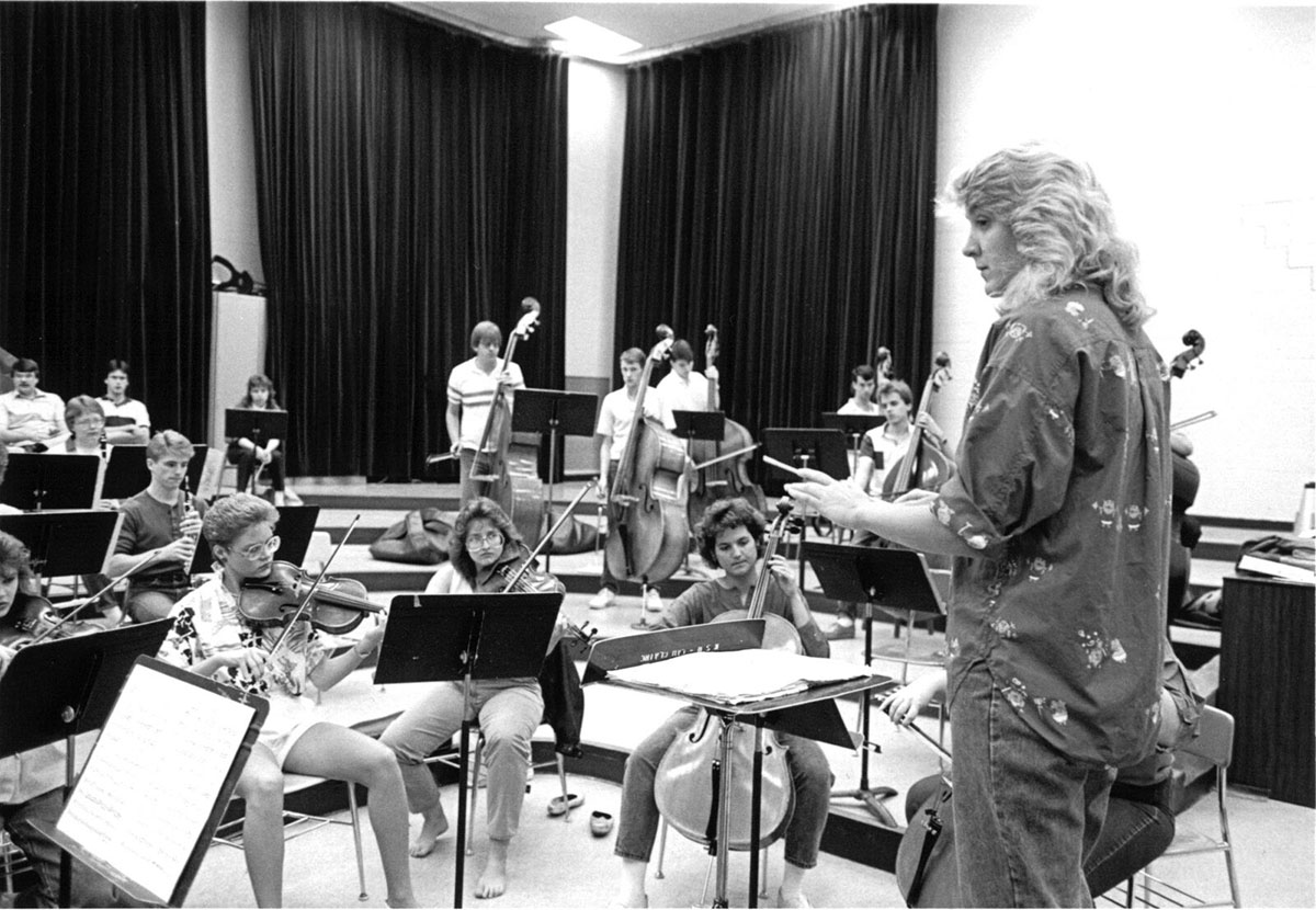 Students play their instruments in band practice, circa 1980s.