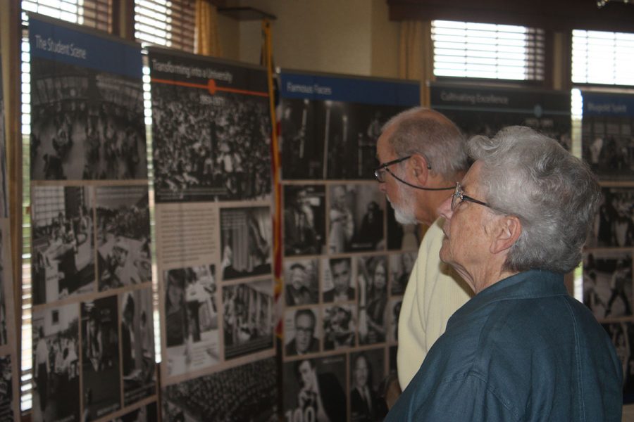 UW-Eau Claire alumni hailing from a host of decades and points on the map spent early Wednesday afternoon viewing the university’s centennial displays to get a grasp of the past, before Chancellor Schmidt gave a presentation outlining the future. (Gabriel Lagarde) 
