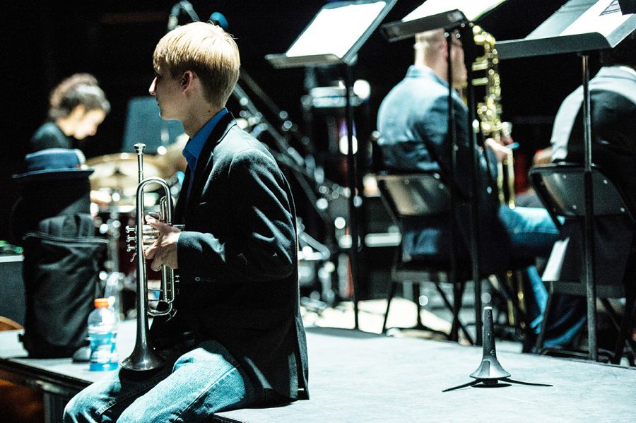 Kristofer Bergh, senior trumpet performance student backstage warming up before Jazz 1 took the stage.