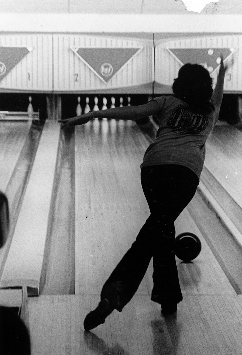 Students have access to the Bowling and Billiards Club on campus and can bowl for $2 per game. Shown is a student bowling at Hilltop Center circa 1976.