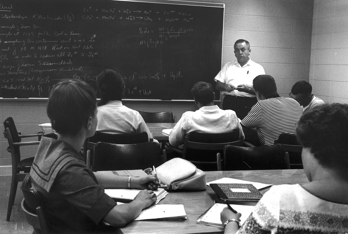 Students in a math class, circa 1970. The Student Success Center offers Math Lab for students who need help in their mathematical studies.