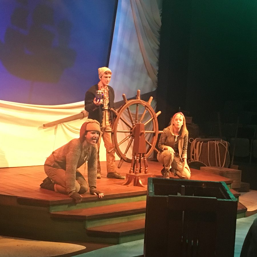 Joey Sletner, Tristen Wilkes and Emily Elliot perform in the shipwrecked scene of the Music and Theatre Department’s newest production “Shipwrecked!: The Amazing Adventure of Louis de Rougemont As Told By Himself.”