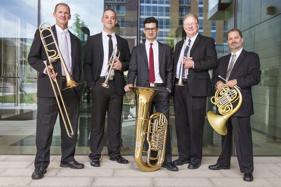 Each+of+the+members+of+the+Wisconsin+Brass+Quintet+pose+with+their+instruments.