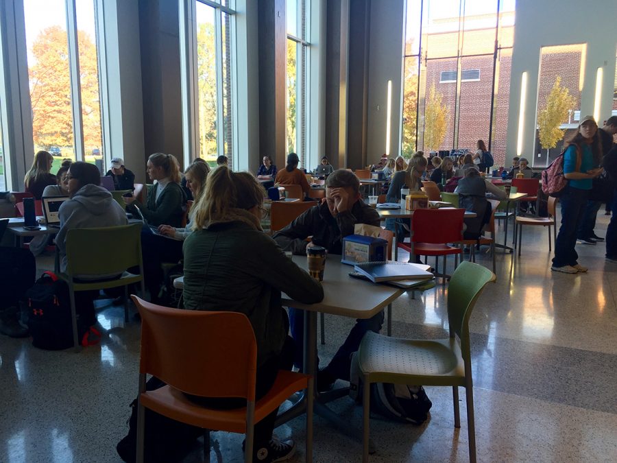 College student millennials crowd Einstein Bagels in Centennial Hall to sip coffee while working through the busiest time of the semester.