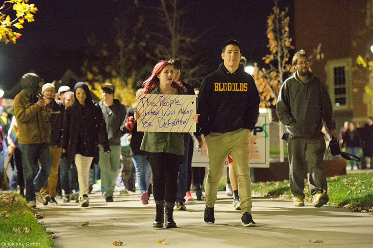 UW-Eau Claire students Aubrie Peterson and Robert Nguyen organized the anti-Trump march Thursday night after the election. Together the two spoke to demonstrators before  their march downtown.