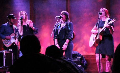 The three lead vocalists, Bex Morton (left), Hannah Morton (middle) and Mookie Morton (right) along with their electric guitarist, Evan Middlesworth (far left), performed a set compiled of their originals from their first EP and singles.