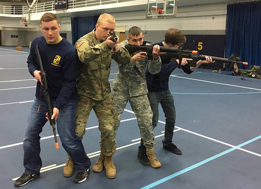 Alexander Miller (far right) and three other cadets in the ROTC program got a chance to participate in a simulated military mission as part of their Military Science and Leadership 202 class. 