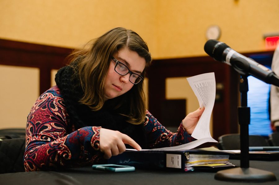  Of-Campus Senator Bobbi Freagon, pictured, reviews the College Republicans special funds allocation bill during Monday’s Student Senate Session. 