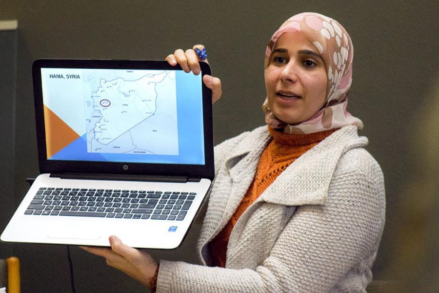 Ghada Ghazal talks about her personal experiences in Syria and her path to becoming an interfaith speaker with Eau Claire community members Thursday at the Ecumenical Religious Center.
