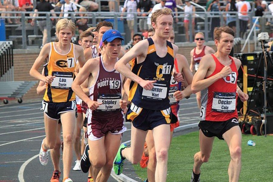 Darin Lau (left) broke his own school record for the 10,000-meter run by over 20 seconds last week in Lacrosse with a time of 29:23.42 seconds.