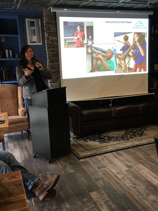 Caitlin Marlotte, executive director of the nonprofit organization Vega, presented on a mobile app meant to connect classrooms and students with the musical instruments they lack.
