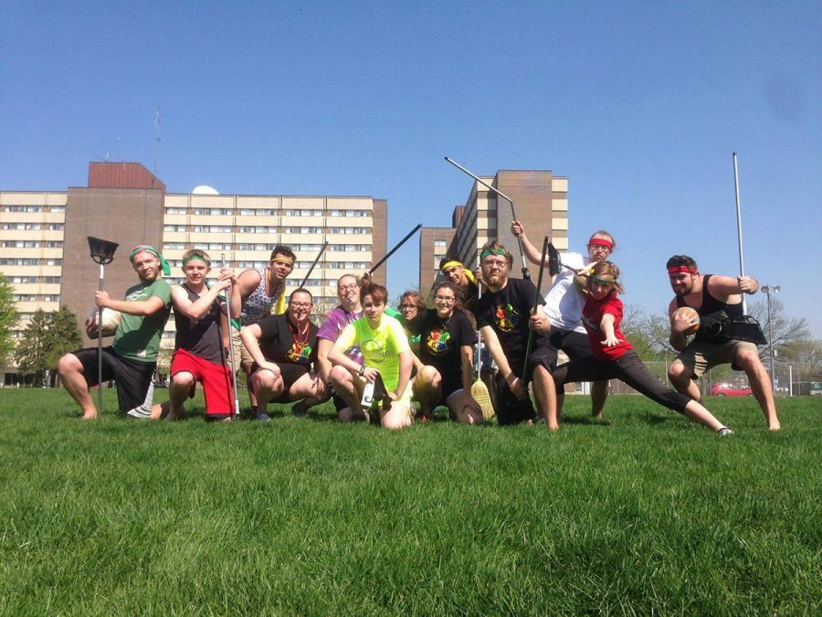 The Eau Claire Student Ministry of Magic poses for a photo after playing Quidditch. While the club has its basis in Harry Potter, the aim of the executive members is inclusivity and acceptance for all.
