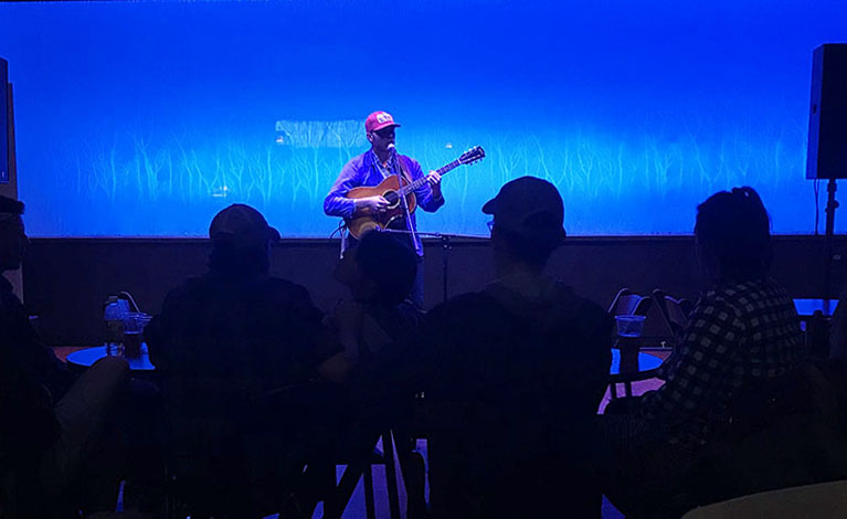 Nick Lanser, lead of folk band Len Voy, plays original songs based on personal experiences from his life.