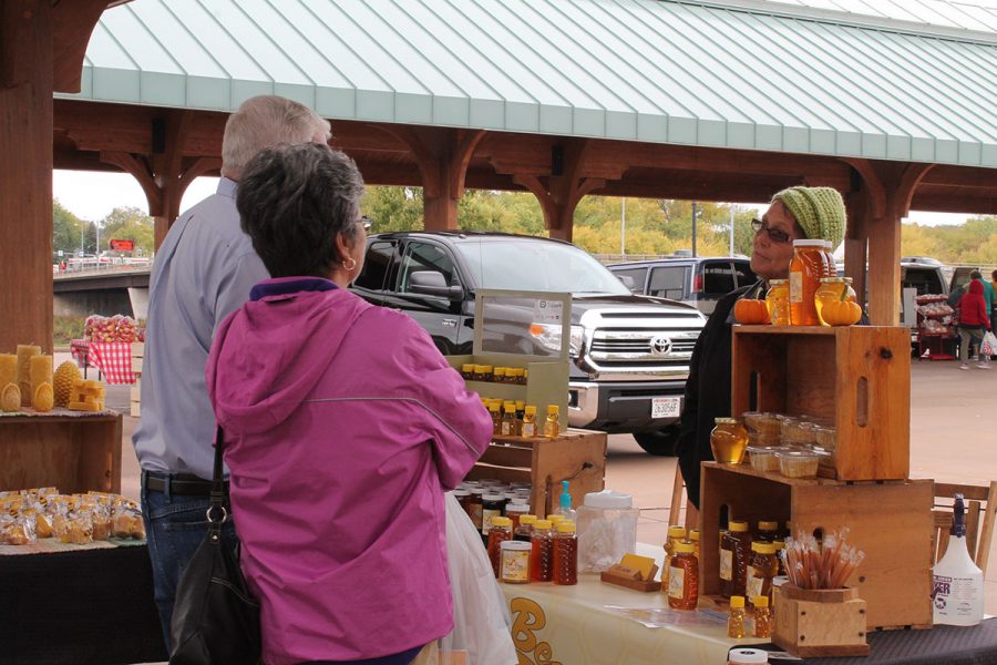 Eau+Claire+community+members+gather+in+Phoenix+Park+to+buy+local+produce+and+goods+from+a+multitude+of+vendors.+