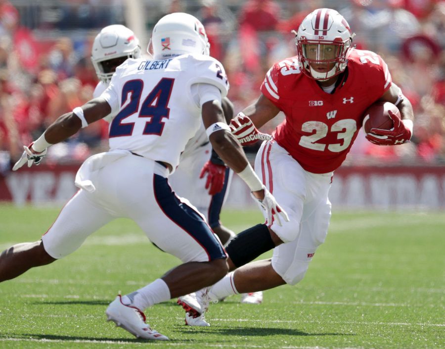 Wisconsin+Running+Back+Jonathan+Taylor+rushed+for+nearly+2%2C000+yards+as+a+first-year+competitor.+%0A