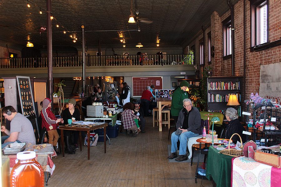 Shoppers peruse the Menomonie winter market at Raw Deal.