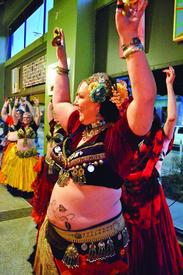People gathered Saturday night to watch belly dance performances by Lasa Anahata Tribal and Geek Slink Belly Dance.