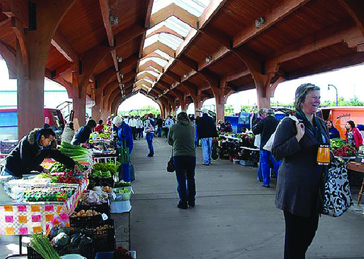 The Eau Claire farmers market, Just Local Food, and various restaurants are several options where local food is available for purchase and consumption.