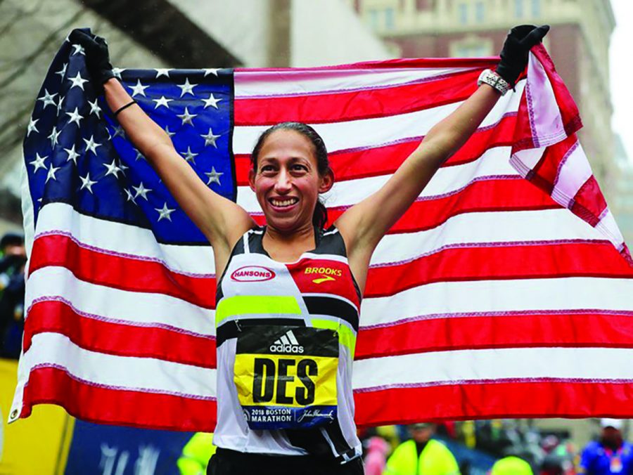 Desiree Linden finishing the Boston Marathon in first for the women’s category.
