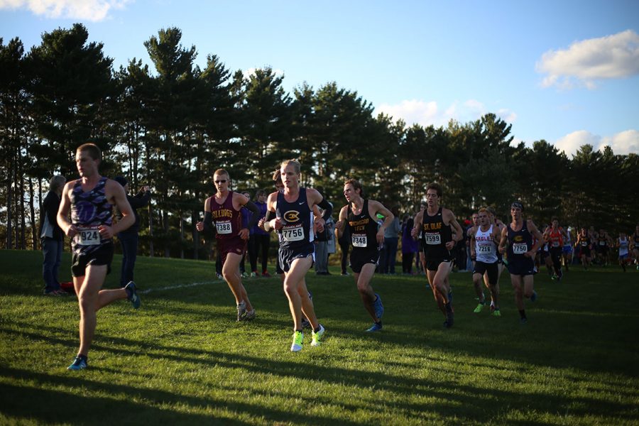 In a pack by Christian LeSac, a first-year, part of the mens cross country team works together to finish the race on Friday. Up next for the team is the UW-Oshkosh invite on Oct. 13. 