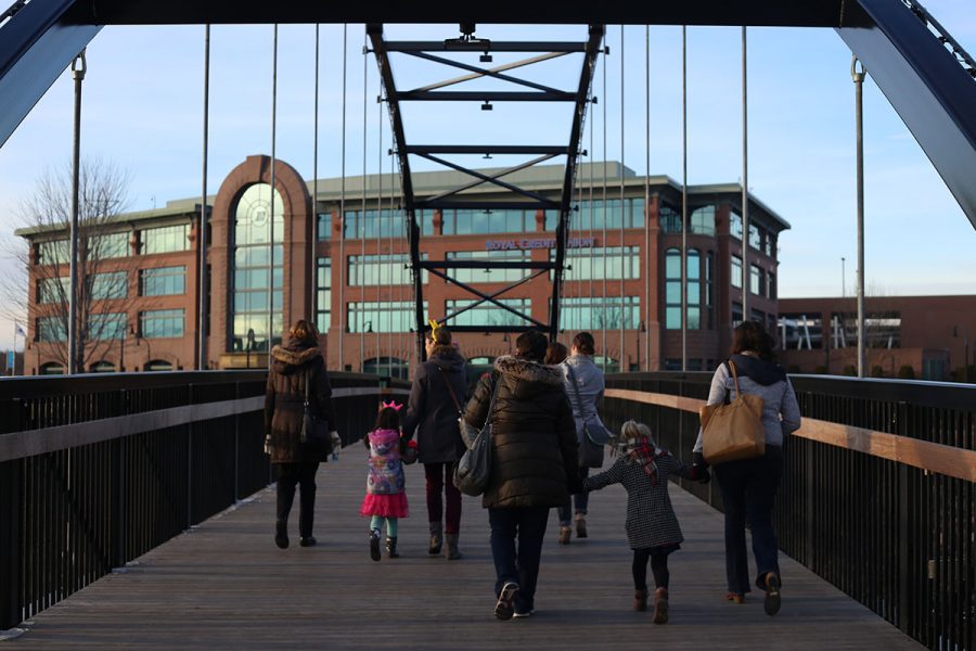Families strolled across the most recent Eau Claire bridge to be installed this past summer.